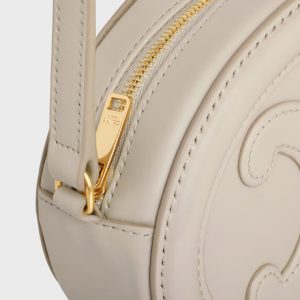 CROSSBODY OVAL PURSE CUIR TRIOMPHE IN SMOOTH CALFSKIN TRENCH