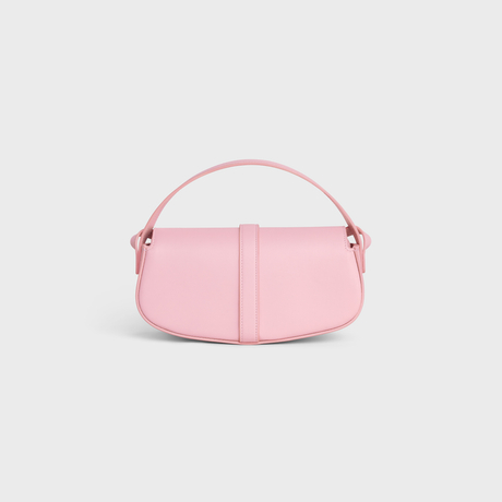 CLUTCH ON STRAP TABOU IN SMOOTH CALFSKIN PINK