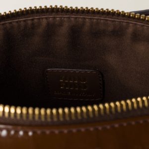 Naplak patent leather pouch