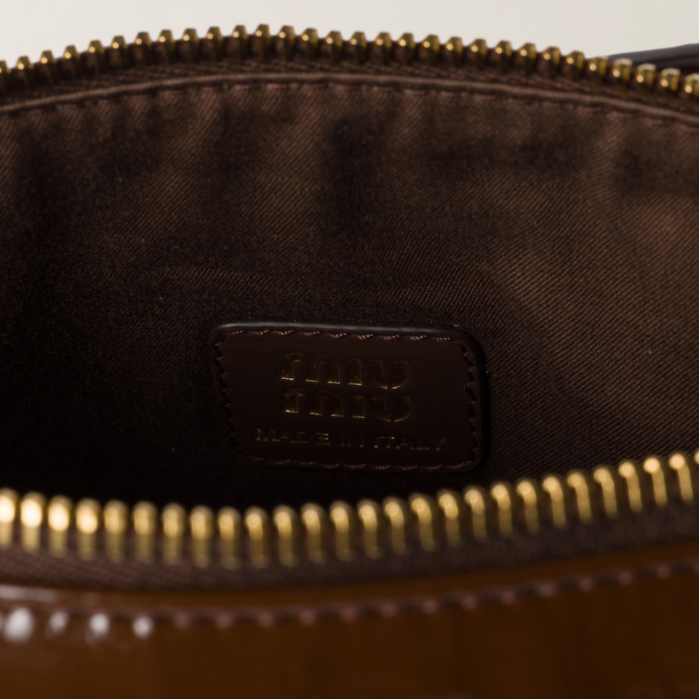 Naplak patent leather pouch