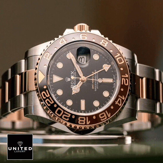 Rolex GMT-Master II Black Dial Ceramic Indices 126711CHNR-0002 Replica on the table